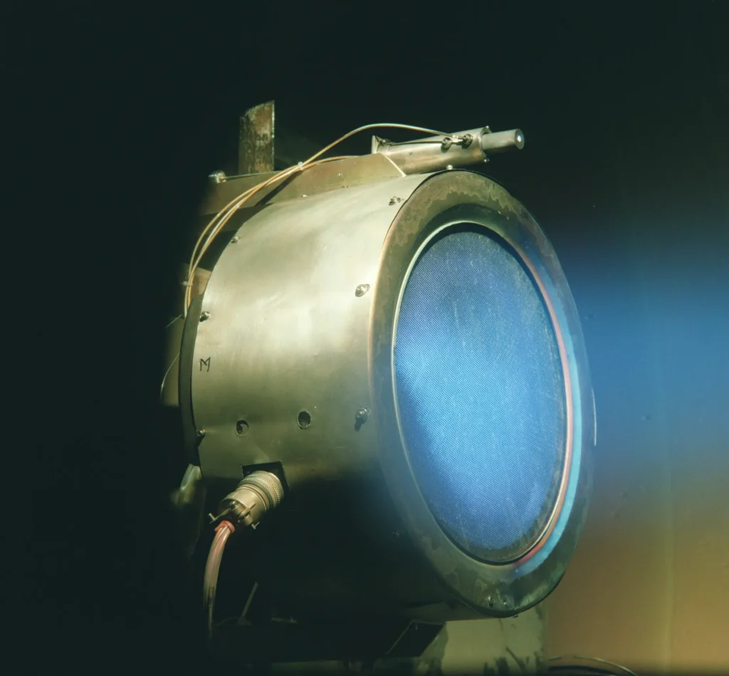 A prototype of a xenon ion engine being tested at NASA's Jet Propulsion Laboratory (2005). A prototype of a xenon ion engine being tested at NASA's Jet Propulsion Laboratory (2005).